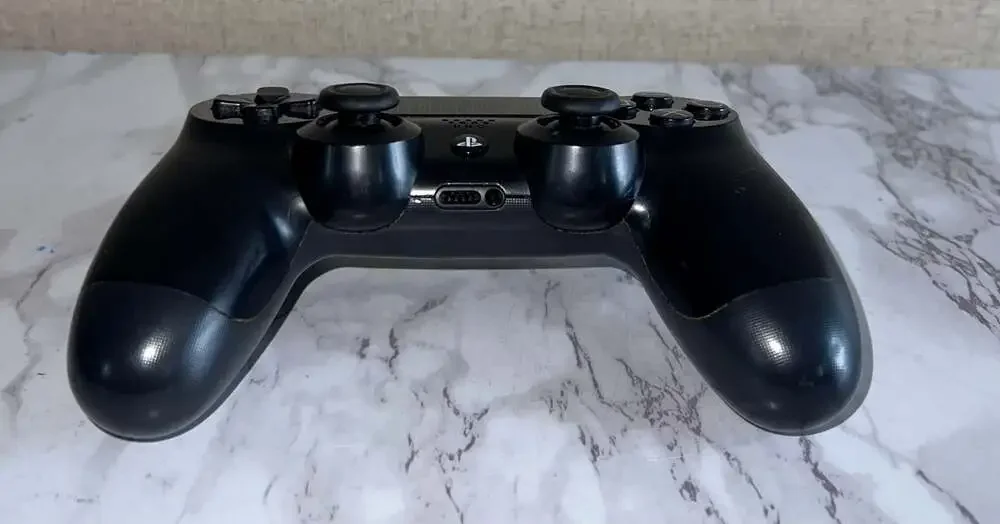 Sony DualShock 4 Wireless Controller for PlayStation 4, Jet Black